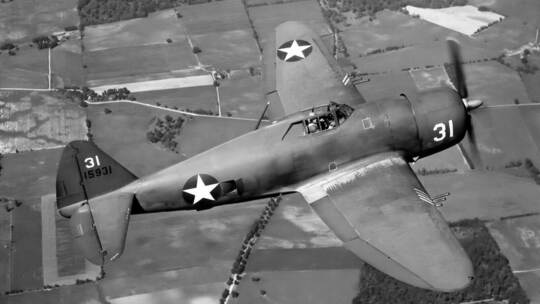 A Republic P-47 Thunderbolt in flight, the American World War II fighter aircraft produced from 1941 through 1945. It was a su