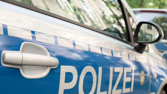 German News Concept: Blue Police Car, Selected Focus