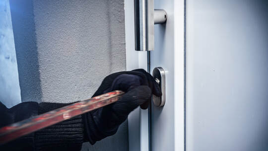masked burglars breaking and entering into a victim's home