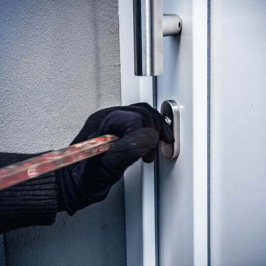 masked burglars breaking and entering into a victim's home