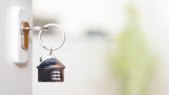 house key in the door