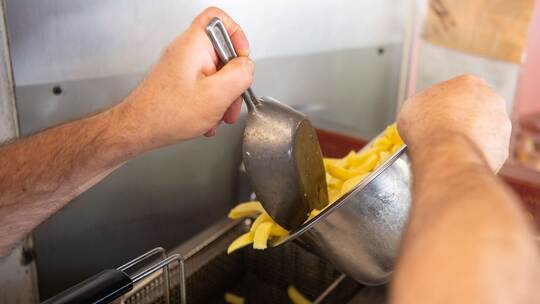 Speiseöl in einer Fritteuse Speiseöl in einer Fritteuse