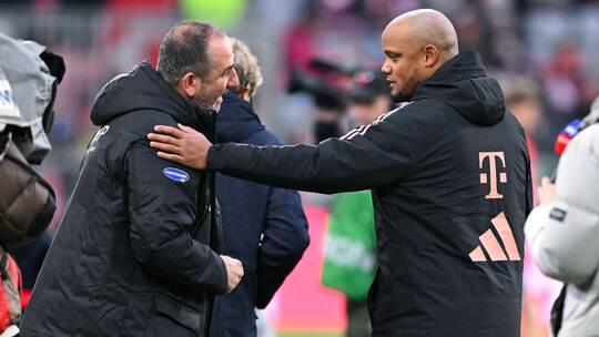 Frank Schmidt (l) und Vincent Kompany