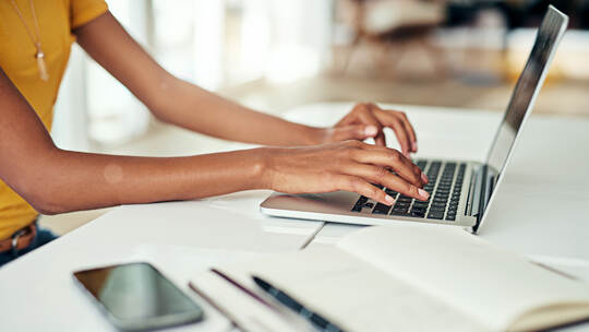 Woman, hands and email on laptop in office for typing or communication, task management and spreadsheet for time tracking. Busin