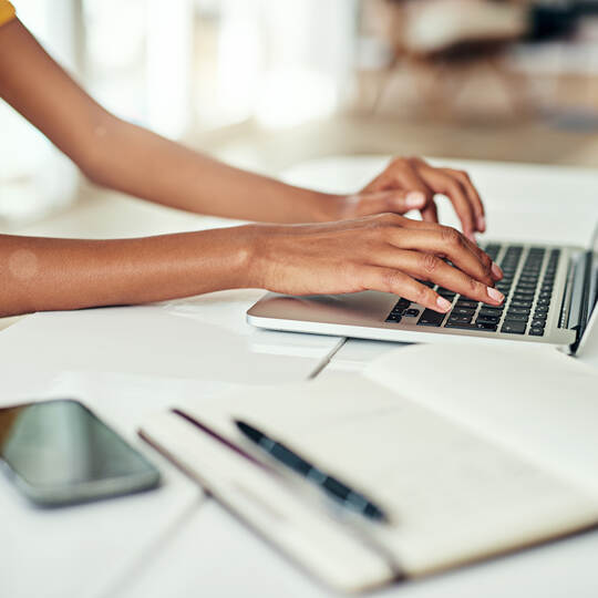 Woman, hands and email on laptop in office for typing or communication, task management and spreadsheet for time tracking. Busin