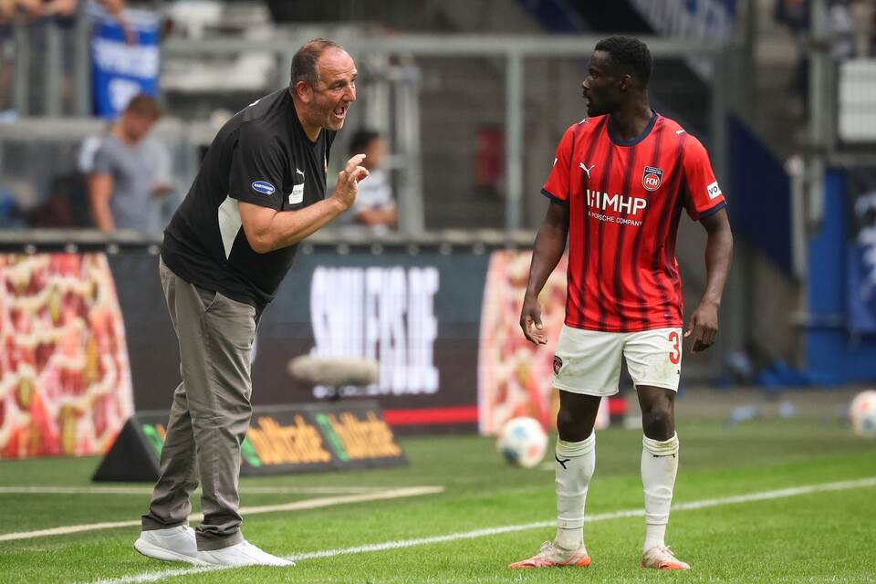 Frank Schmidt und Sirlord Conteh