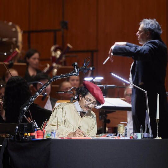 Live-Zeichner Ernesto Lucas bringt die Musik von Tschaikowski, Dukas, Rota und Williams aufs Papier. Tilo Keller Sinfoniekonzert "Die Geburt der Filmmusik" Badische Philharmonie Pforzheim. Leitung: Daniel Inbal. Live-Zeichner: Ernesto Lucas.