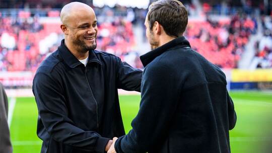 Vincent Kompany (l) und Julian Schuster (r)
