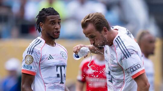 Michael Olise (l) und Harry Kane Michael Olise (l) und Harry Kane