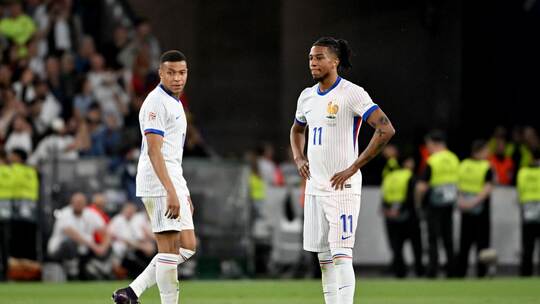 Kylian Mbappé (l) und Michael Olise Kylian Mbappé (l) und Michael Olise