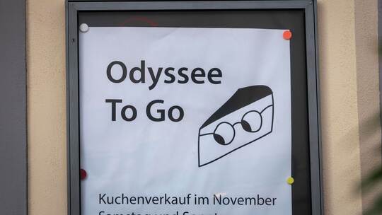 Schriftzug «Odyssee To Go» Schriftzug «Odyssee To Go»