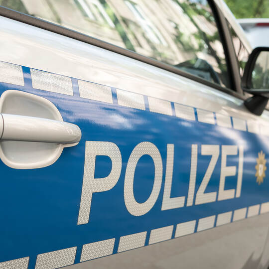 German News Concept: Blue Police Car, Selected Focus