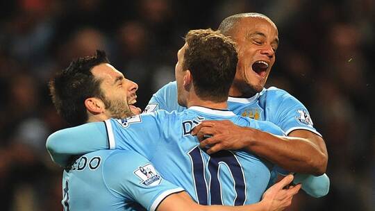 Edin Dzeko und Vincent Kompany Edin Dzeko und Vincent Kompany