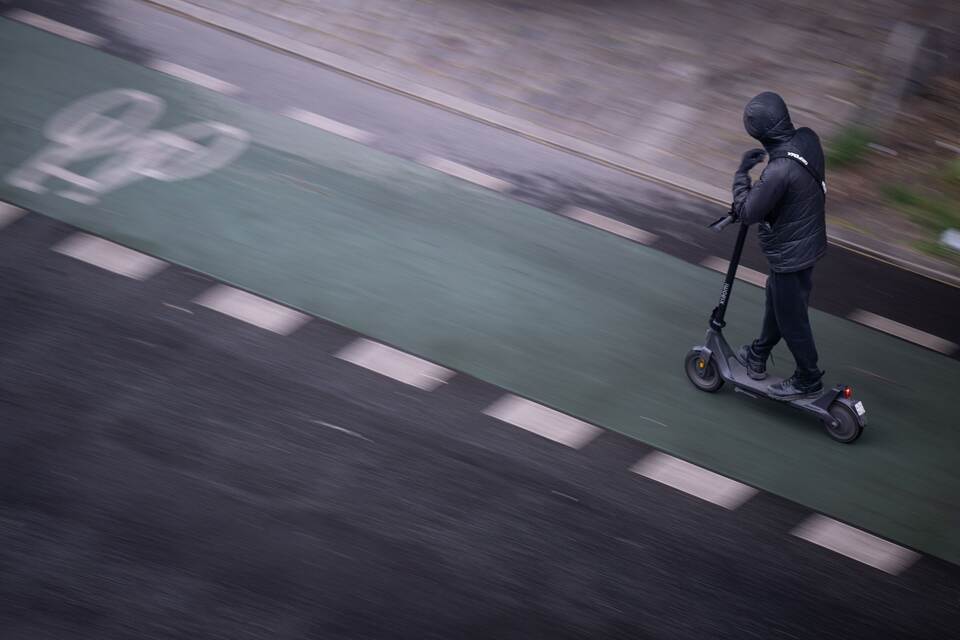 E-Scooter-Fahrer E-Scooter-Fahrer