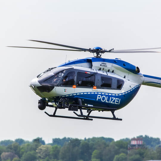 dusseldorf, nrw/germany - 12 05 18: german police helicopter in the air at dusseldorf airport germany