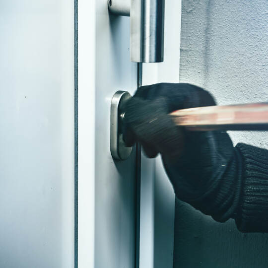 masked burglars breaking and entering into a victim's home