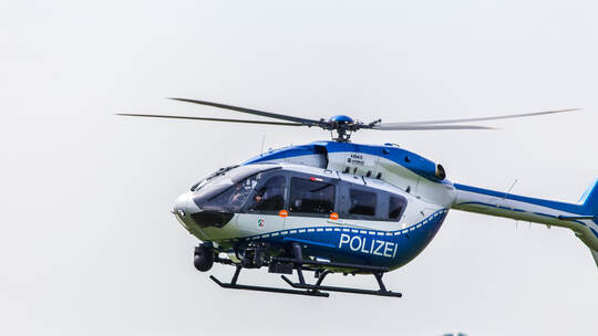 dusseldorf, nrw/germany - 12 05 18: german police helicopter in the air at dusseldorf airport germany