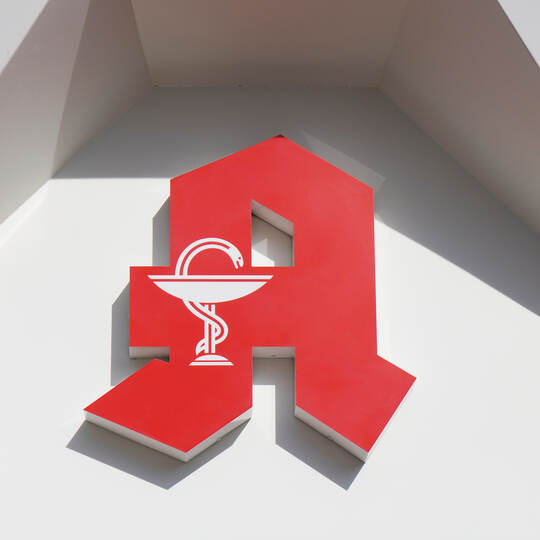 German Apotheke - which translates as pharmacy or drugstore - with red A logo sign in Hannover, Germany on March 16, 2020