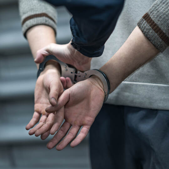 handcuffing the arrested person. Implementation of the arrest