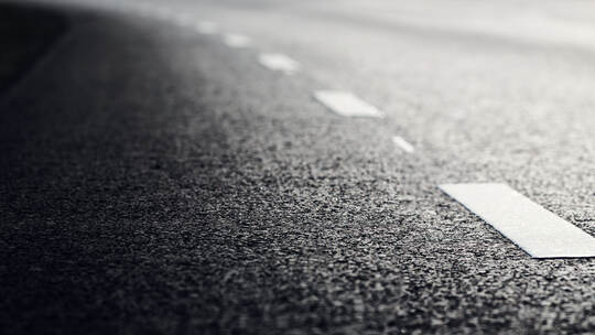 Asphalt road and dividing lines