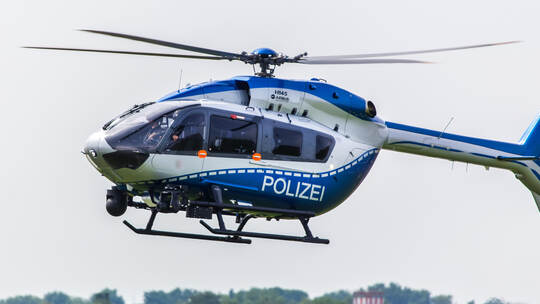 dusseldorf, nrw/germany - 12 05 18: german police helicopter in the air at dusseldorf airport germany