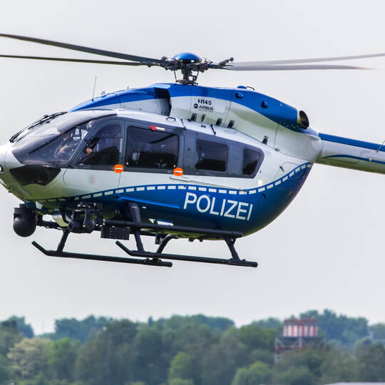 dusseldorf, nrw/germany - 12 05 18: german police helicopter in the air at dusseldorf airport germany